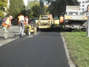 Opravy silnic, údržba vozovek, asfaltování Praha -  pokládka živičných (asfaltových) koberců